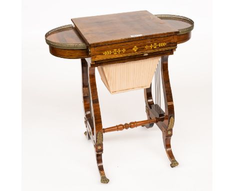 A REGENCY GILT-METAL MOUNTED ROSEWOOD GAMES TABLE74cm wide; 42cm deep, 76cm highCondition report: ;The brass inlaid top centr