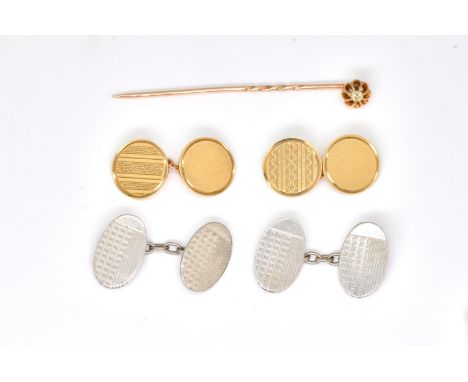TWO PAIRS OF CUFFLINKS AND A TIE PIN (3)Comprising; a pair of 9ct gold cufflinks with circuar backs and fronts, engine turned