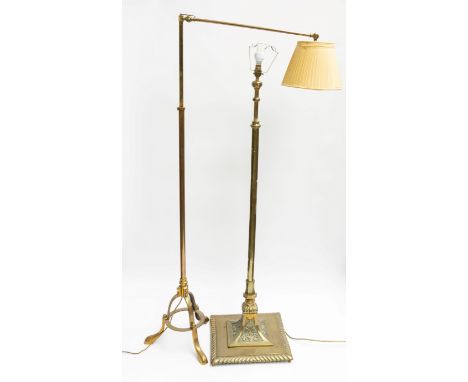 AN ADJUSTABLE BRASS STANDARD LAMP ON TRIPOD BASE, WITH ANOTHER BRASS STANDARD LAMP (2)20th CenturyAdjustable lamp on three sp