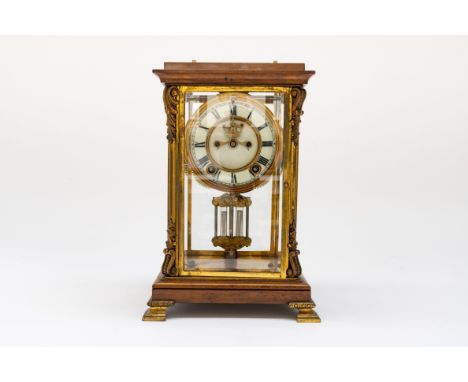 AN AMERICAN FOUR GLASS GILT-BRASS MOUNTED WALNUT MANTEL CLOCKBy Ansonia, New York, Early 20th CenturyWith Roman hours to the 