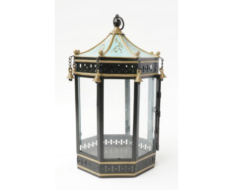 AN OCTAGONAL PAGODA STYLE PAINTED LANTERN20th CenturyWith glazed side panels and bell capped corners, 45 cm high