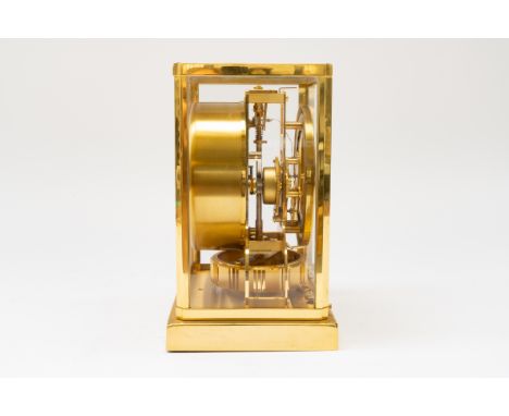 JAEGER LECOULTRE, A GILT BRASS ATMOS CLOCK20th CenturyNo. 434489, with white dial and gilt hour numerals and marks, case 18cm