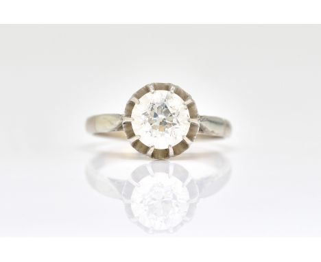 A WHITE GOLD AND PLATINUM, DIAMOND SINGLE STONE RINGClaw set with a cushion shaped diamond, detailed 18 CT &amp; PLAT, ring s