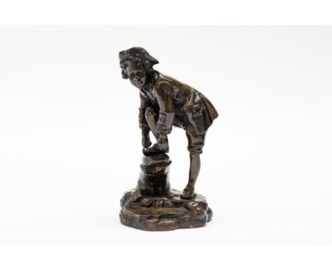 A FRENCH BRONZE FIGURE OF A BOY WITH AN ICE SKATE19th CenturyModelled tying his ice skate, 15.5cm highCondition report:&nbsp;