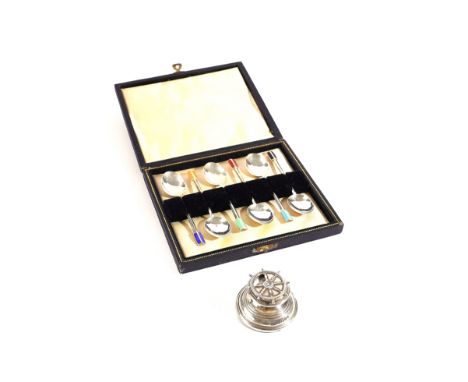 A SET OF SIX SILVER COFFEE SPOONS AND A SILVER MOUNTED WHIST MARKER (2)The set of six coffee spoons having differing coloured