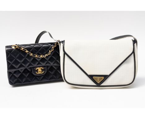 CHANEL- A BLUE LEATHER CLASSIC FLAP BAG AND AN YVES SAINT LAURENT BLUE AND WHITE HANDBAG (2)With Chanel box and authenticity 