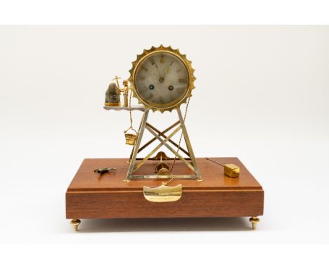 A SOUTH AFRICAN PRESENTATION TWIN TRAIN MANTLE CLOCKWith presentation plaque engraved '1000000 Tons Presented to Jack Van Els