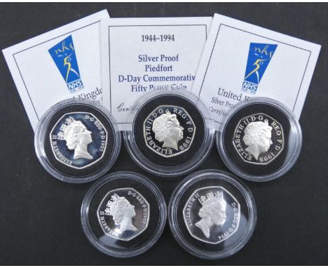 Five Royal Mint silver proof fifty pence coins. Including a 1998 National Health Service NHS Piedfort 50p Silver Proof Coin, 