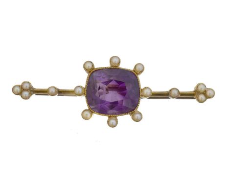An early 20th century amethyst and split pearl brooch. The cushion shape amethyst within a split pearl surround, to the simil