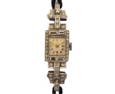 An Art Deco diamond manual wind cocktail watch by Croton. The signed square shape dial with arabic markers and outer minutes 