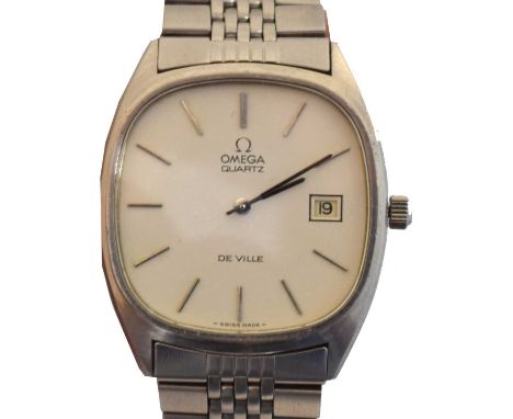 A 1970s Omega De Ville quartz wristwatch, ref. 192.0028. The signed cushion shape white dial with baton markers and date aper