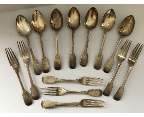 A set of six George V silver dessert spoons (by Wilson &amp; Gill, London 1923), together with a set of four matching dessert