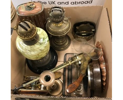 Two boxes of metalwares to include two oil lamps, a pair of three branch candelabras, a coal bucket with Dutch style decorati