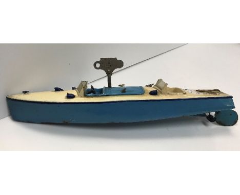 A Hornby Meccano clockwork speed boat (Racer III), blue and cream painted (no box) together with a Pelham Puppets Mr McBoozle
