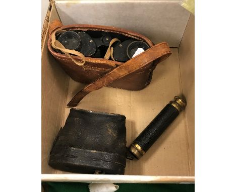 A pair of leather clad binoculars or opera glasses, a four draw telescope and a pair of binoculars in brown leather case
