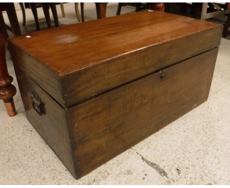 A circa 1900 teak trunk of plain form with iron carrying handles 80 cm wide x 45.5 cm deep x 40 cm high