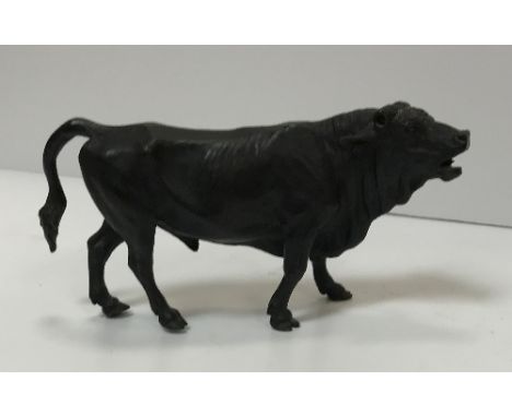 A 19th Century French chocolate patinated bronze figure in the manner of Bayre depicting a baying Charolais bull (horns missi