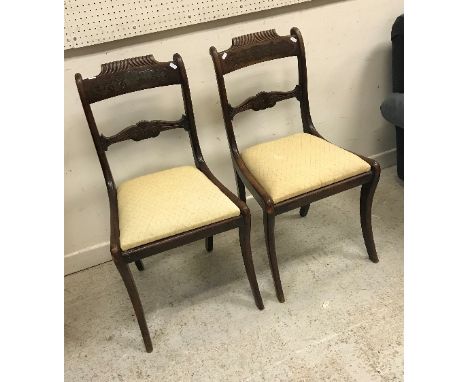 A pair of late Regency rosewood and brass inlaid bar back dining chairs on sabre legs together with a pair of 19th Century ma