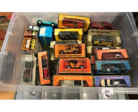 A box containing assorted die-cast and other models to include a 00 gauge Trackmaster N2 locomotive clockwork toy from the ea