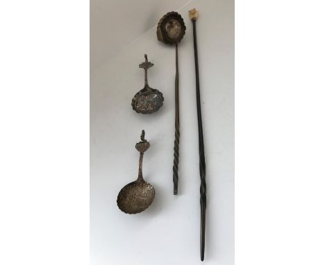 A white metal toddy ladle with whale bone handle, a similar 19th Century backscratcher with ivory hand and a Victorian silver