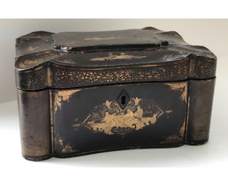 A 19th Century black lacquered and chinoiserie decorated tea caddy of shaped rectangular form, the side panels with studies o