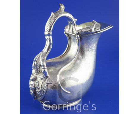 A Victorian textured silver Askos jug by John Hunt & Robert Roskell, with applied cast goat surmounts and pierced acanthus le