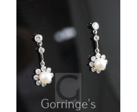 A pair of early 20th century white gold, cultured pearl and diamond cluster drop earrings, of flower head design, 22mm.