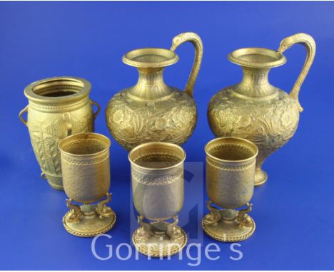 A pair of 1960's ancient Greek revival 900 standard silver gilt beakers by Ilias Lalaounis, on tripod dolphin supports and ci