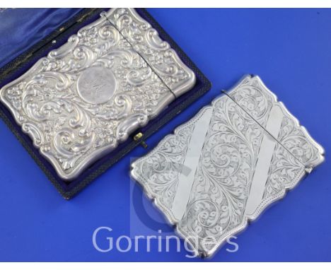 An Edwardian silver card case, with engraved monogram and embossed with scrolling foliage, Deakin & Francis Ltd, Birmingham, 