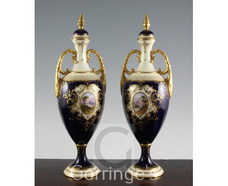 A pair of large Coalport oviform pedestal vases and covers, c.1902, painted with titled vignettes of Loch Tay and Katrine, po