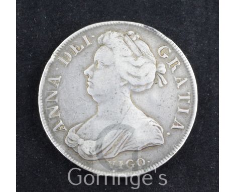 A Queen Anne silver crown, first bust Vigo 1703, Good Fine, pitting to reverse