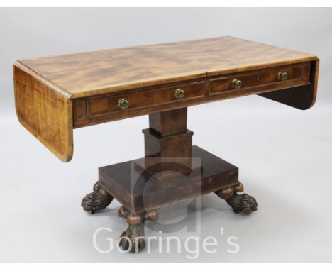 A Regency satinwood sofa table, with burr wood crossbanding and two frieze drawers, on stepped square pedestal with rectangul