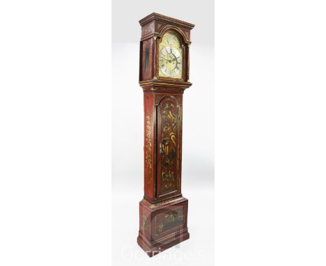 Edward Woodward of London. An early 18th century red chinoiserie lacquered eight day longcase clock, the 12 inch arched brass