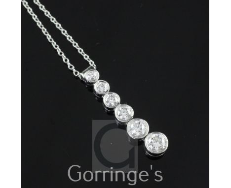 A modern Tiffany & Co Jazz platinum and diamond drop pendant necklace, with six collet set graduated round brilliant cut diam