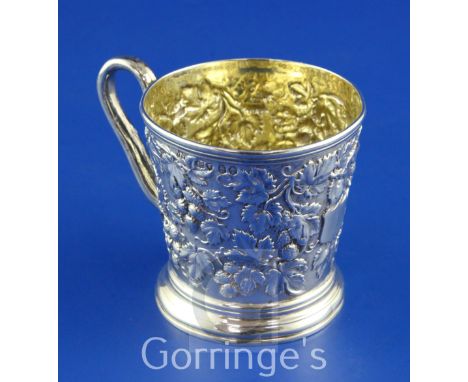 A Victorian silver christening mug by John Samuel Hunt, of tapering cylindrical form, with rustic handle, vacant cartouche an