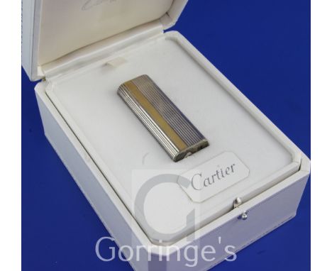 A 1970's Must de Cartier parcel gilt silver limited edition commemorative QEII Silver Jubilee gas lighter in original box wit