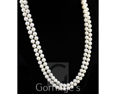 A double strand cultured pearl necklace with stylish 14ct gold, ruby, sapphire and diamond set clasp, stamped with Chinese ch