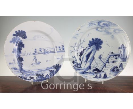 Two English delft ware chargers, the first painted with a European scene of figures on a lake, the second with a Chinese figu