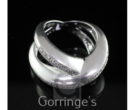 A modern Italian Chimento 18ct white gold and diamond set x-shaped crossover ring, size O.