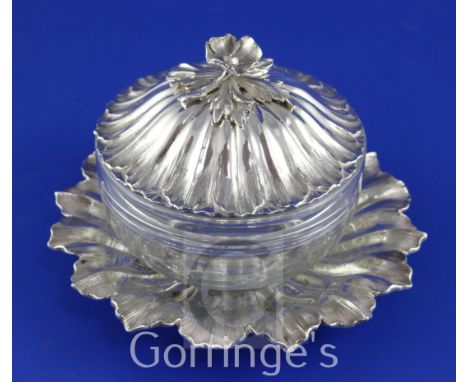 A William IV silver 'buttercup' butter dish with cover and stand by Charles Thomas Fox, with engraved glass bowl and floral f