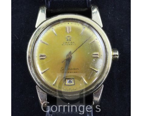A gentleman's 1950's 14ct gold Omega Seamaster Calendar automatic wrist watch, with baton numerals and date aperture at the 6