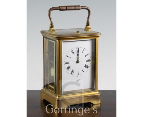 A late 19th century French gilt brass hour repeating carriage clock, the enamelled dial signed Examined by Donne, Cornhill, t