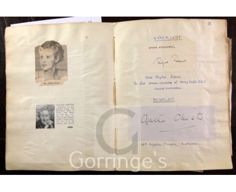 An autograph album - lined notebook containing twenty signed photographs, including: Agatha Christie (early publicity portrai