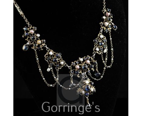A late 19th/early 20th century Austro-Hungarian Renaissance Revival 800 standard parcel gilt silver drop necklace, set with b
