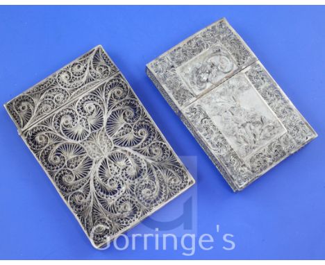 A Chinese silver filigree card case, decorated in relief with dragons and flowers and another filigree card case with engrave