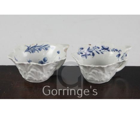 Two Worcester blue and white butter boats, c.1760-65, the first in a rare version of Butter Boat Formal Rose, length 8.2cm, r