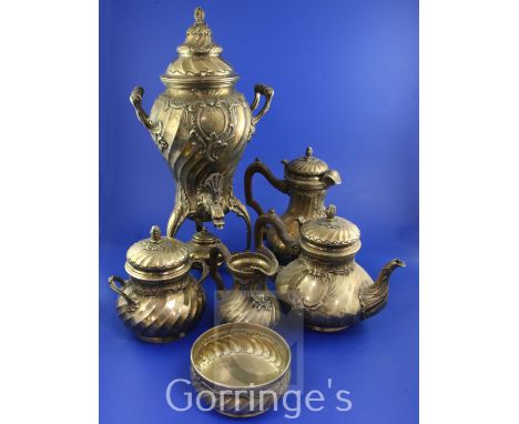 A late 19th century French 950 standard silver gilt six piece tea and coffee service by A. Risler & Carre, Paris, with import