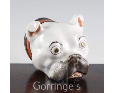 A Staffordshire porcelain bulldog's head table snuff box, c.1860, with enamelled details including an orange and black collar