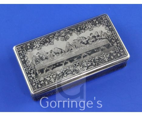 A late 19th century French silver and niello rectangular snuff box, the lid decorated with scene of The Last Supper, French e