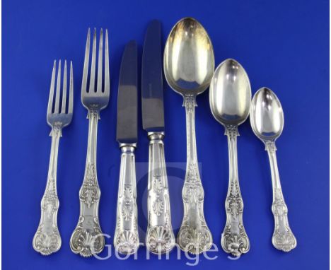 A matched 19th century part suite of silver double struck Queen's pattern flatware, with engraved armorial on the majority, c